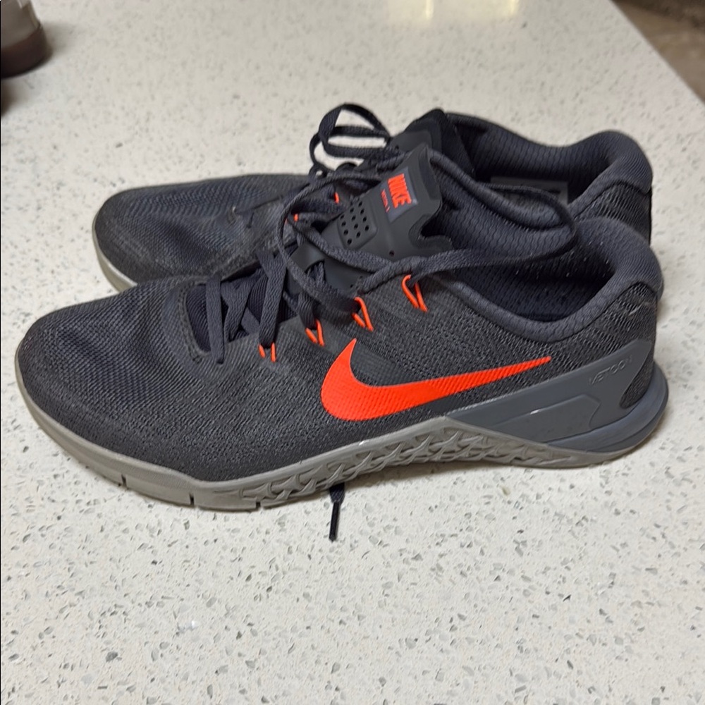 Nike Black and Red Sneakers with Modern Design